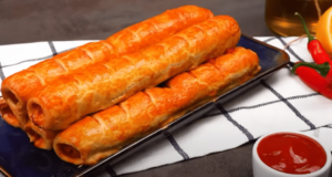 Przepis na fantastyczną i szybką w przygotowaniu przekąskę – Parówki w serze i cieście francuskim!